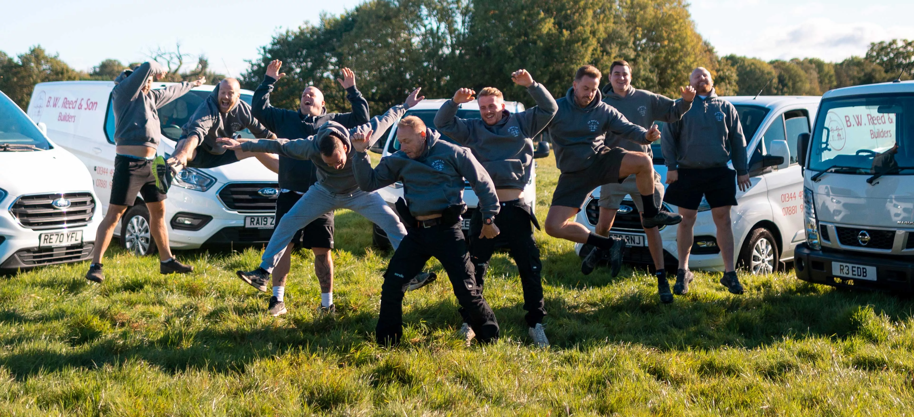 The B.W. Reed and Son Building Team in Berkshire - Jumping in the air!