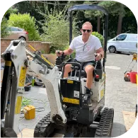 This is an image of Paul Reed on the Bobcat Digger at a home extension in Crowthorne, Berkshire.